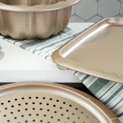 BergHOFF Balance Non-stick Carbon Steel Perforated Pizza Pan 12.5" -BergHOFF Store GUEST 72c18d16 db6a 4b9b 8b47 900b789f1a83